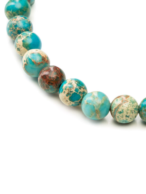 Zbliżenie na bransoletkę z turkmenitu Balamonte – detal naturalnych kamieni w turkusowym odcieniu