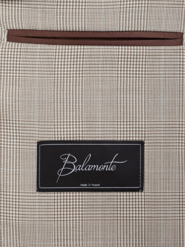 Beżowej marynarki męska z wewnętrzną kieszonką z białą podszewką i metką Balamonte Made in Poland
