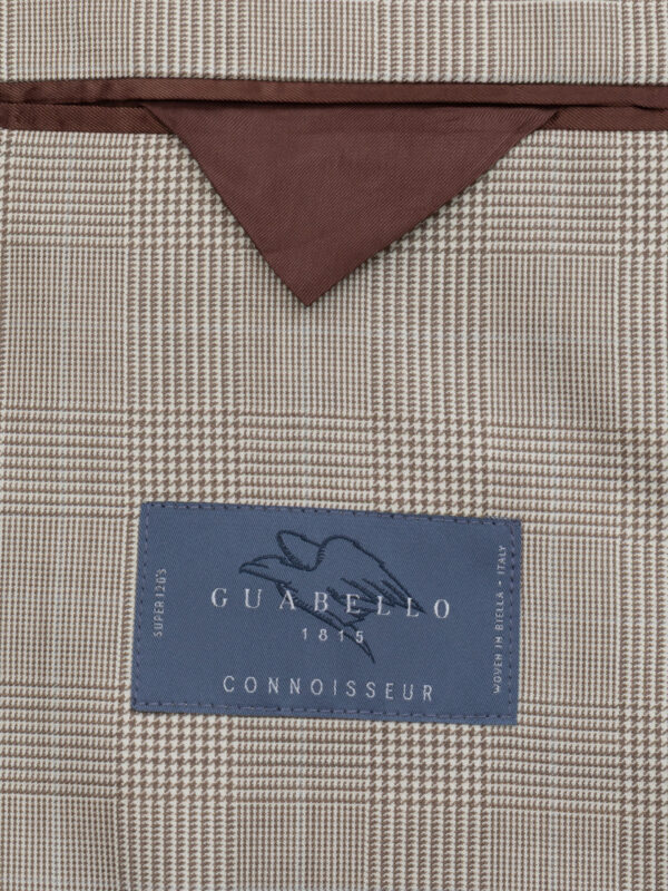 Beżowej marynarki męska z wewnętrzną kieszonką z białą podszewką i metką Guabello 1815 Motion